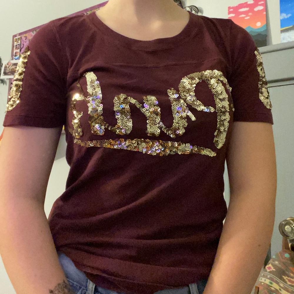 Maroon top with sparkly words